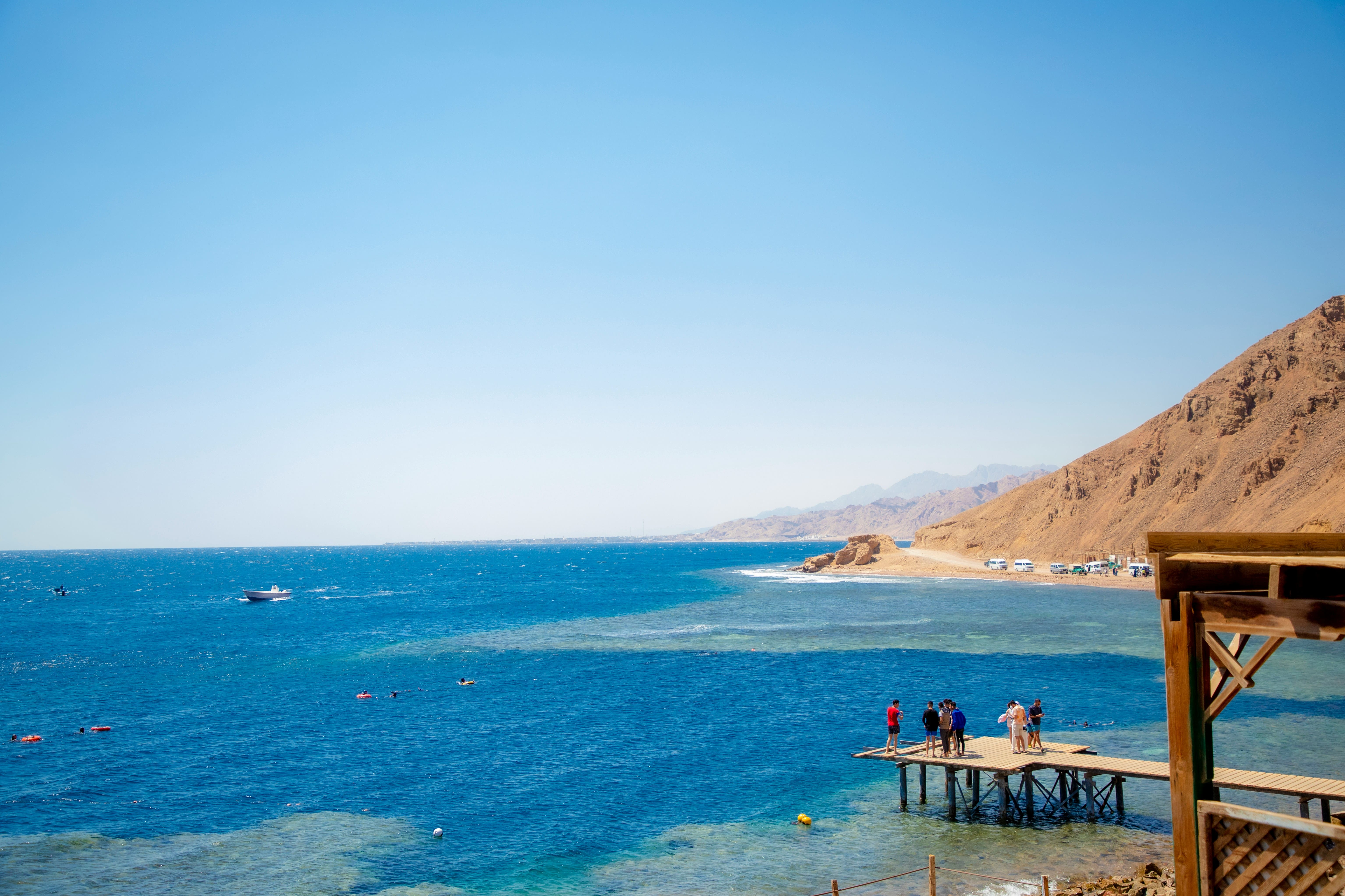 blue sea with people 